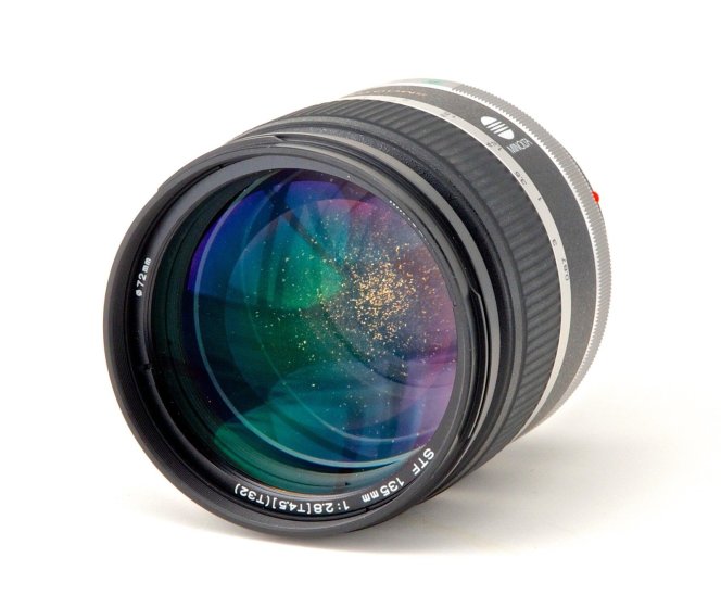 Minolta STF 135mm f/2.8 [T4.5] with gold flakes? | DPReview Forums