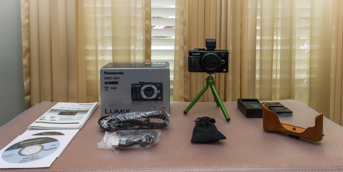 MINT - As New: Two Lumix GX1 camera bodies - both with DMW-LVF2