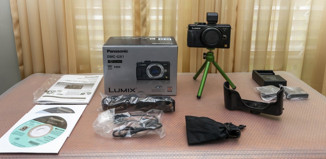 MINT - As New: Two Lumix GX1 camera bodies - both with DMW-LVF2