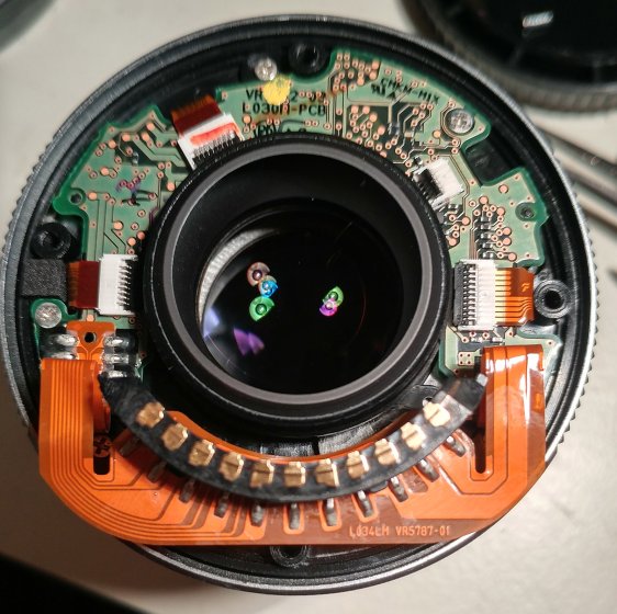 Disassembling an Olympus 45mm 1.8 lens. | DPReview Forums