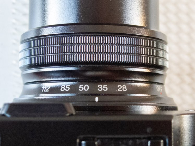 Fujifilm X10 did it right marking the zoom in full frame numbers