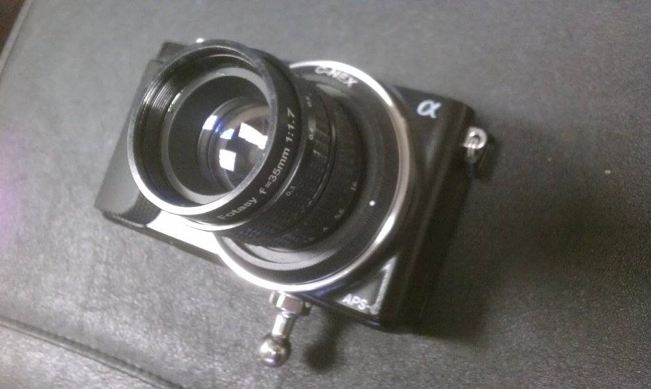 Has anyone used the Fujinon 25mm f0.85 C-MOUNT on a NEX