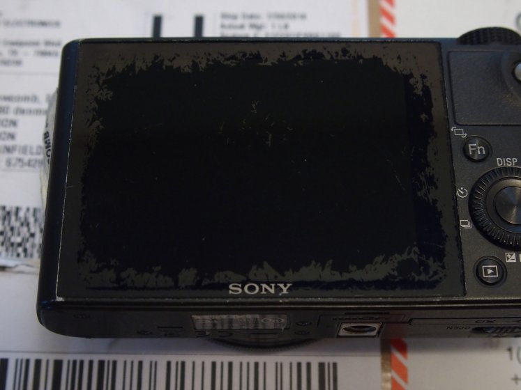 RX100: LCD's Internal De-lamination; Spots on Sensor Second Time ...